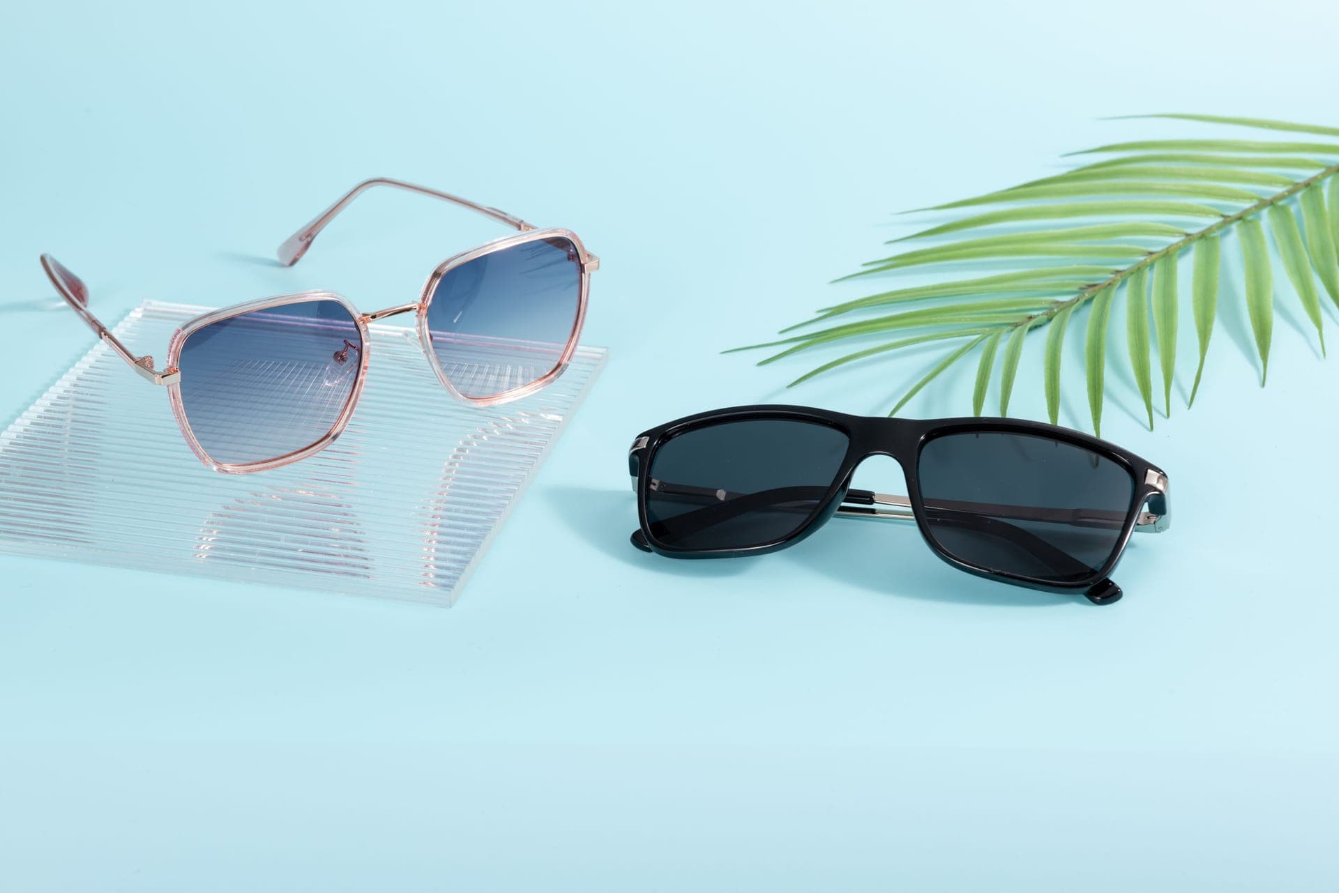 Close detail of a tinted sunglasses lens and acetate frame edge